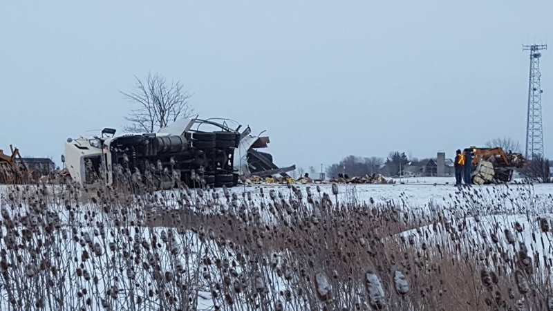 A tractor trailer lays on its side after a fatal crash on highway 401 at Union Road on Thursday, Feb. 16, 2017. (Justin Zadorsky / CTV London)