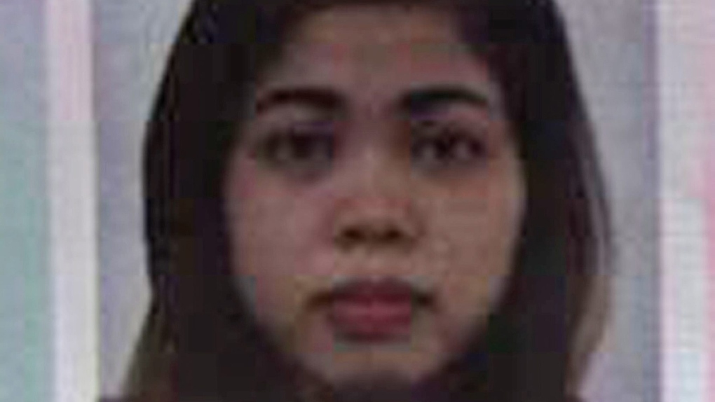 Passport photo of Siti Aisyah