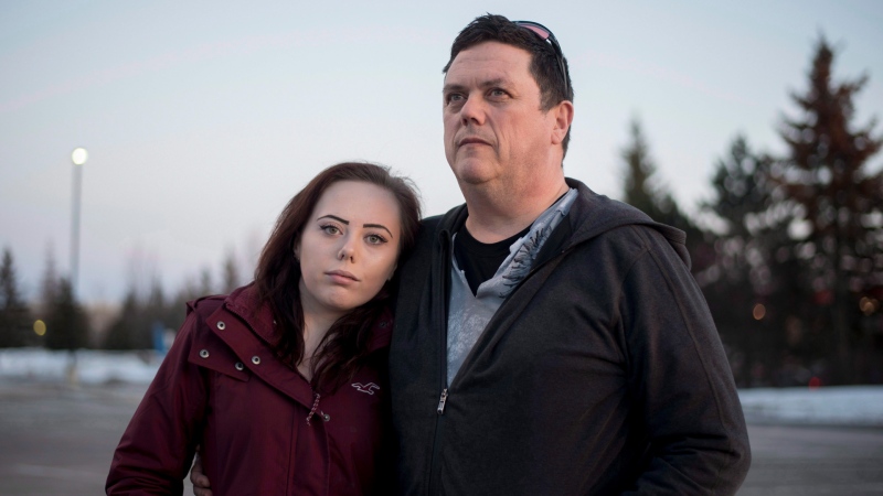 Sean O'Leary stands with his daughter Paige, 16, who has struggled with drug addiction, in the Ottawa suburb of Kanata, Monday, Feb. 20, 2017.  (Justin Tang/THE CANADIAN PRESS)