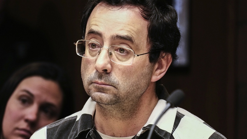 Dr. Larry Nassar listens to testimony of a witness during a preliminary hearing, in Lansing, Mich. on Friday, Feb. 17, 2017. (Robert Killips / Lansing State Journal)