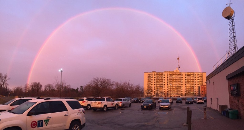 A rainbow stretches over the CTV Kitchener parking lot and King's Tower apartment building on Tuesday, March 7, 2017. (Jeff Turner / CTV Kitchener)