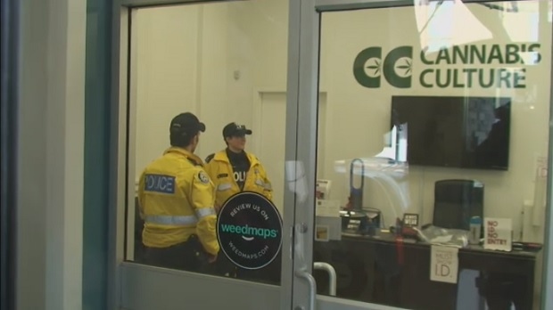 This file photo shows police raiding a Cannabis Culture location on Queen Street East as part of 'Project Gator.'