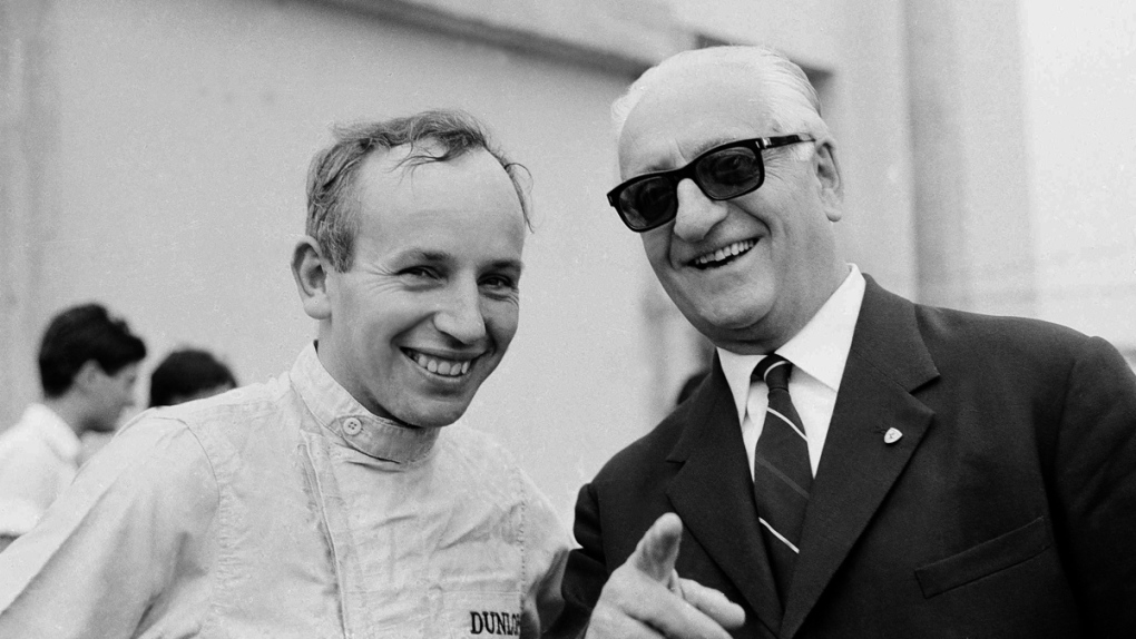 John Surtees, left, and Enzo Ferrari in 1964