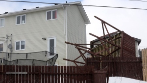 The damage from Saturday's windstorm is evident Sunday, March 12, 2017 in the St. John's metro area. Residents in Newfoundland and Labrador are taking stock of the damage caused by this Saturday's fearsome windstorm. (THE CANADIAN PRESS/Paul Daly)