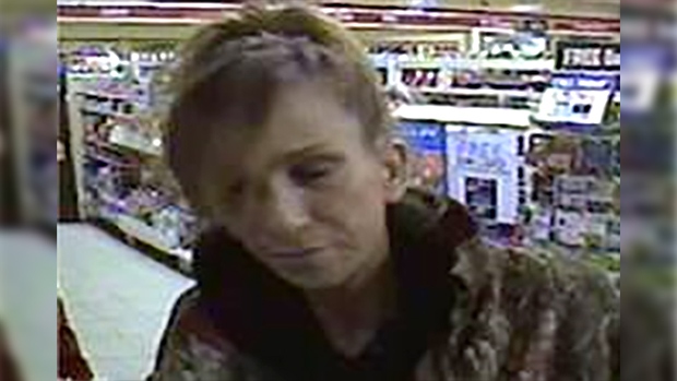 Windsor Police released this photo of a female fraud suspect on Tuesday, March 14, 2017. (Windsor Police)