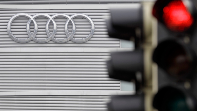 Audi logo seen behind a red light in Ingolstadt, Germany, March 15, 2017. (Matthias Schrader / AP)