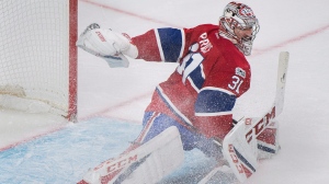 Montreal Canadiens goaltender Carey Price makes a save against the Ottawa Senators during second period NHL hockey action in Montreal, Sunday, March 19, 2017. THE CANADIAN PRESS/Graham Hughes