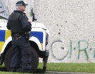 A police Service of Northern Ireland officer on security patrol in a housing estate in Craigavon, Northern Ireland, Monday, March, 16, 2009. (AP / Peter Morrison)