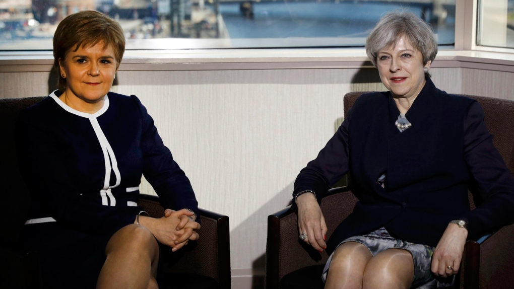 Theresa May, right, and Nicola Sturgeon in Glasgow