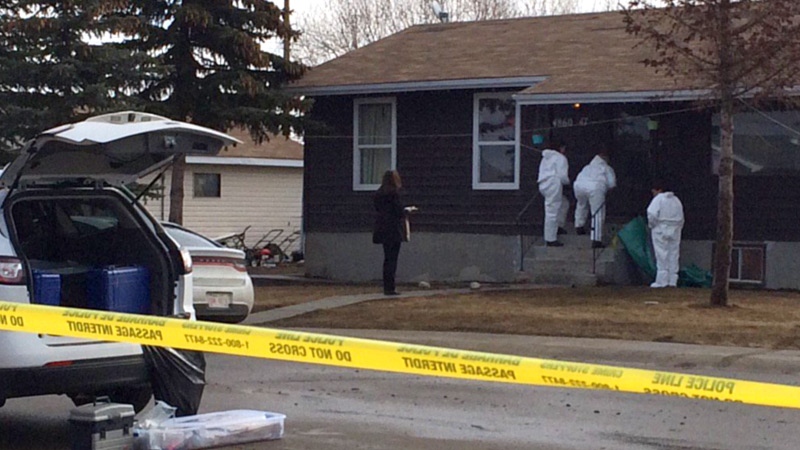 RCMP investigators on the scene of a double homicide in Chipman, Alberta on Monday, April 3, 2017.