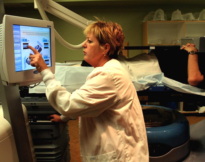 A radiation therapist pinpoints radiation for a prostate cancer patient. (AP / East Valley Tribune, Paul O'Neill)