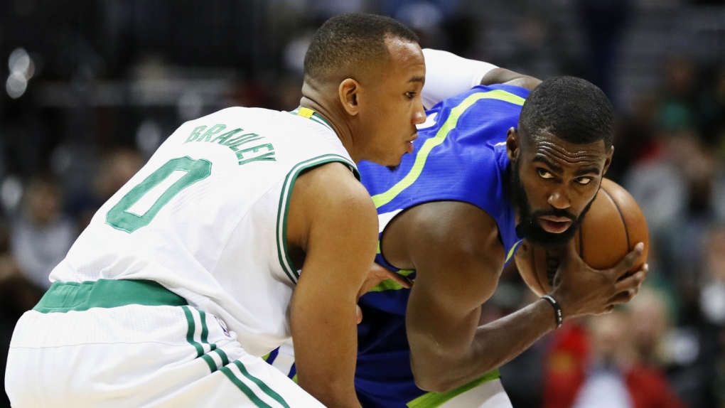Hawks edge Celtics to end losing streak