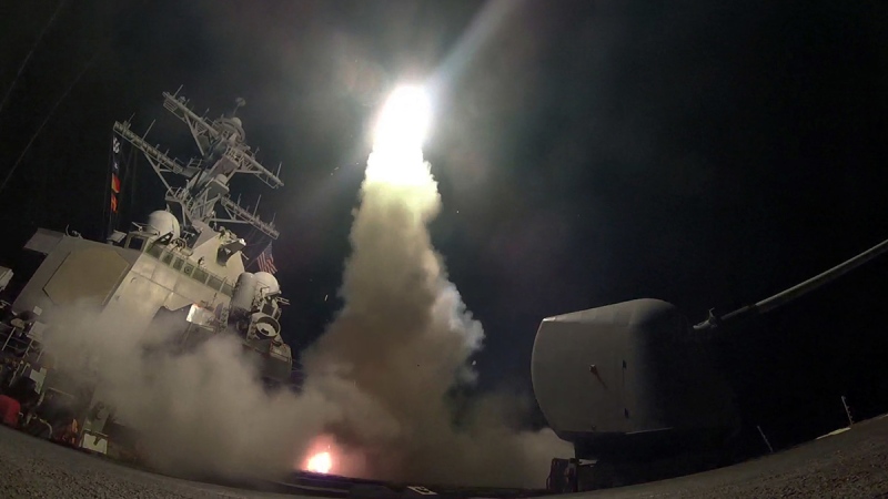In this image provided by the U.S. Navy, the guided-missile destroyer USS Porter (DDG 78) launches a tomahawk land attack missile in the Mediterranean Sea, Friday, April 7, 2017. (Mass Communication Specialist 3rd Class Ford Williams / U.S. Navy via AP)