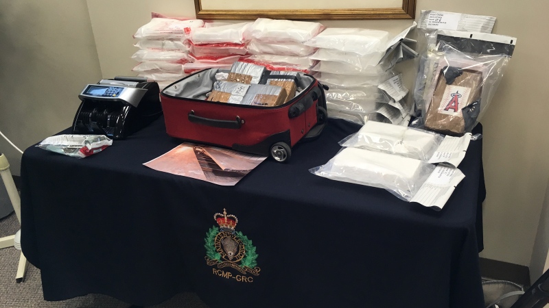 Cocaine and other items seized during an RCMP-led drug investigation are pictured on Friday, April 7, 2017. (Allison Tanner / CTV Kitchener)