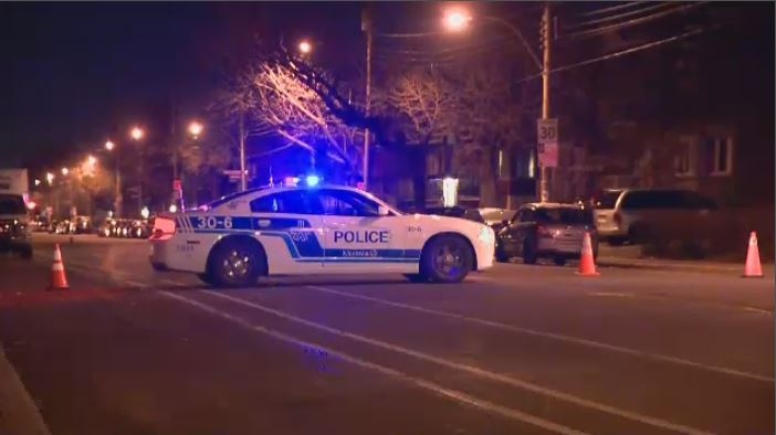 Montreal police investigate scene at St. Zotique and 16th Ave. after pedestrian is hit by car. 
