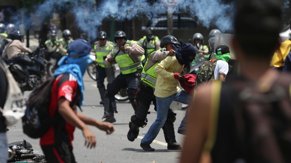 Protesters clash with police in Venezuela