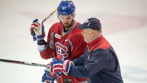 Montreal Canadiens' Alexander Radulov listen to head coach Claude Julien during a practice Monday, April 10, 2017 in Brossard, Que. The Canadiens will face the New York Rangers in the first round of playoffs. THE CANADIAN PRESS/Paul Chiasson