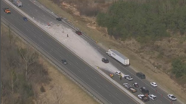 Truck carrying cement blocks flips over on Hwy. 400 | CTV Toronto News