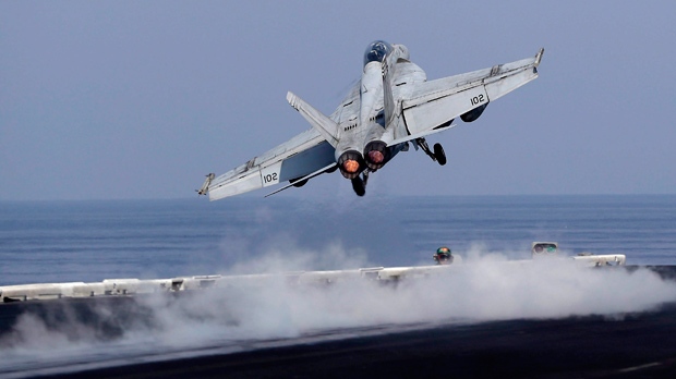 U.S. Navy fighter jet takes off