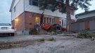 A Ford Mustang struck two townhouses in east London on Wednesday, April 19, 2017. (Justin Zadorsky / CTV London)