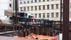 A crane fell on its side at the LRT tunnel entrance near the University of Ottawa on Wednesday.
