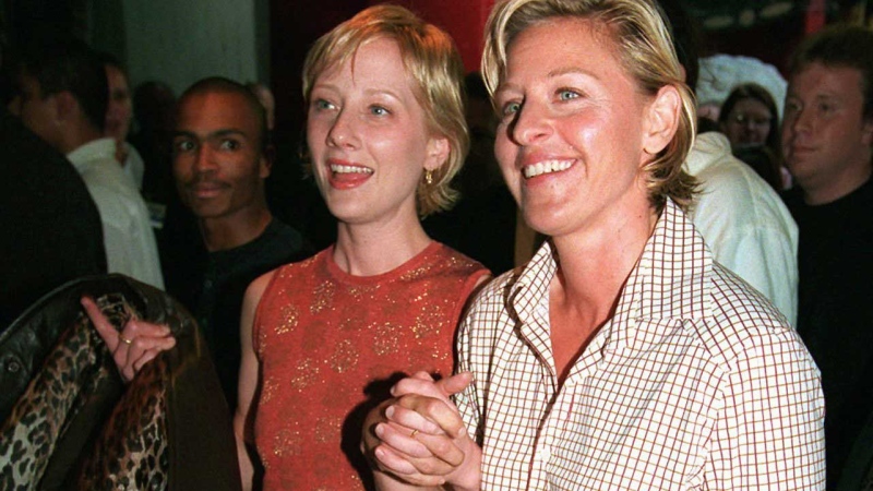 In this June 19, 1997 file photo, actress-comedian Ellen DeGeneres, right, and actress Anne Heche arrive at the world premiere of the film 'Face/Off,' in the Hollywood section of Los Angeles. (AP Photo/Chris Pizzello, File)