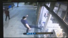 Security video of La Bottega window smashed