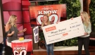 Ellen DeGeneres surprised Maggie Boglitch (centre) with a $20,000 cheque from Shutterfly to help pay for grad school bills. (Courtesy The Ellen DeGeneres Show)