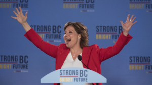 B.C. Liberal leader Christy Clark waves to the crowd at party headquarters in Vancouver following Tuesday's election. (THE CANADIAN PRESS/Jonathan Hayward)