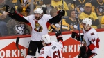 Ottawa Senators' Bobby Ryan, left, celebrates with teammates Mark Stone (61) and Jean-Gabriel Pageau (44) after scoring the game-winning goal against the Pittsburgh Penguins during the overtime period of Game 1 of the Eastern Conference final in the NHL hockey Stanley Cup playoffs, Saturday, May 13, 2017, in Pittsburgh. Ottawa won 2-1 in overtime. (AP Photo/Gene J. Puskar)
