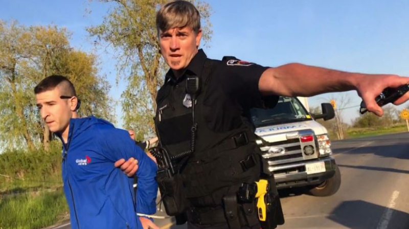Hamilton police arrested freelance photographer David Ritchie and detained Global News cameraman Jeremy Cohn., left, around 8 p.m. at a scene where a 10-year-old girl was struck and killed by a van near her home. (Andrew Collins)
