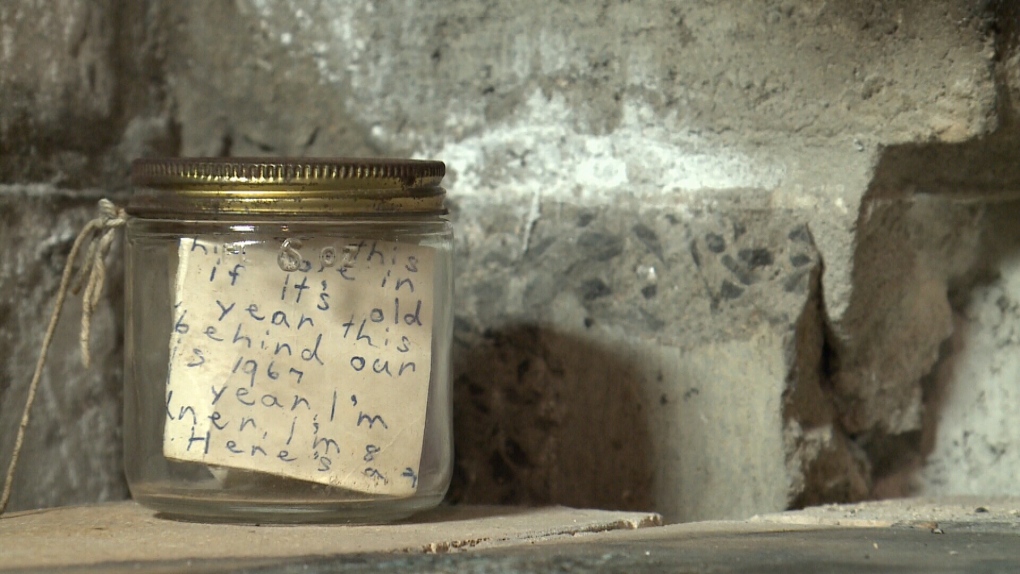 Jar with notes found in fireplace.