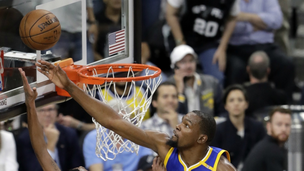Durant blocks a shot for the Warriors