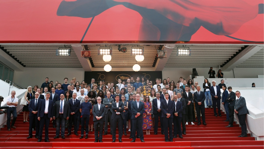Cannes film festival staff hold moment of silence