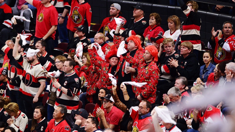 Ottawa Senators fans cheer on their team as they take on the Pittsburgh Penguins during the third period of game six of the Eastern Conference final in the NHL Stanley Cup hockey playoffs in Ottawa on Tuesday, May 23, 2017. (THE CANADIAN PRESS/Sean Kilpatrick)