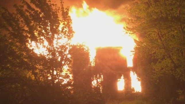 Four people charged with arson after a farmhouse fire in Lakeshore, Ont. (Courtesy OPP)