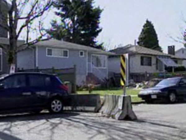 Roadblocks are being set up in front of known gangsters' homes to deter drive-by shootings. Twenty-three-year-old Gurpreet Singh Bains lives at this home, which was targeted by two shootings in September 2007 and November 2008. March 29, 2009.(CTV)