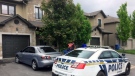Gatineau Police are seen outside the home of a 28-year-old mother who was arrested after her 7-month-old baby died. Katrina Leigh Hazlett has been charged with criminal negligence causing death.  (Jim O'Grady/CTV Ottawa)