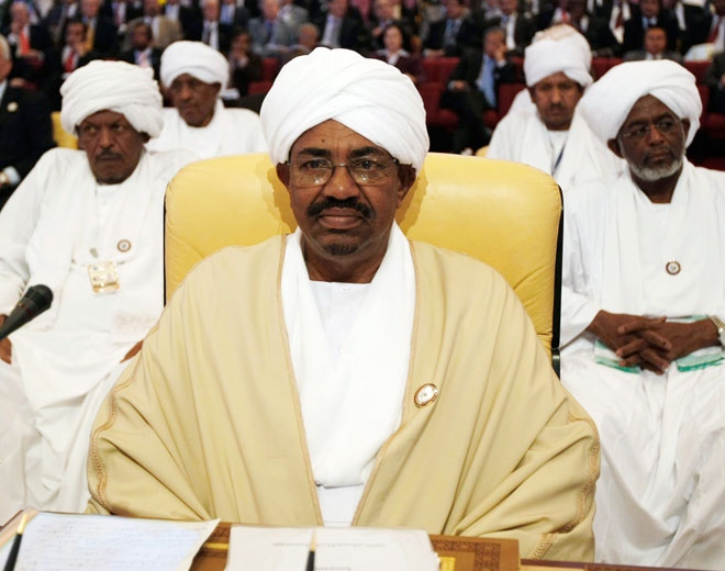 Sudanese President Omar al-Bashir, centre, attends the opening session of the Arab Summit in Doha, Qatar, Monday, March 30, 2009. (AP / Hassan Ammar)