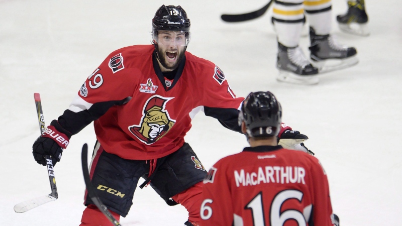 Ottawa Senators centre Derick Brassard (19) celebrates with left wing Clarke MacArthur (16) after scoring against the Pittsburgh Penguins during the first period of game three of the Eastern Conference final in the NHL Stanley Cup hockey playoffs in Ottawa on Wednesday, May 17, 2017. (Adrian Wyld/THE CANADIAN PRESS)