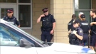 Peel Regional Police officers at the scene of a stabbing at a Mississauga high school on May 31, 2017.