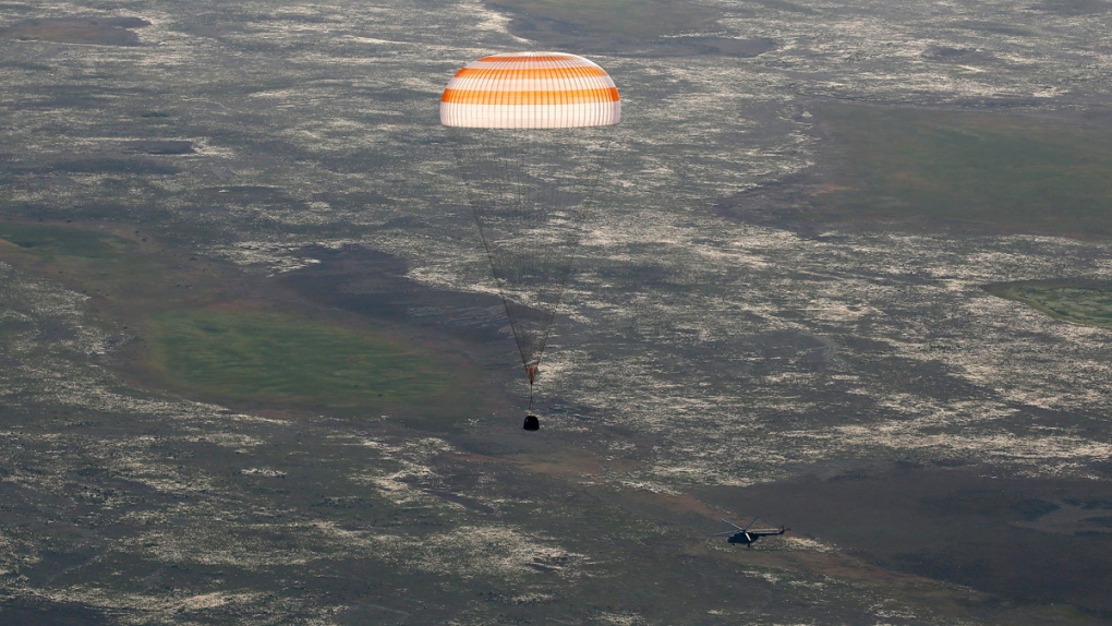 Russian Soyuz capsule descends to Earth