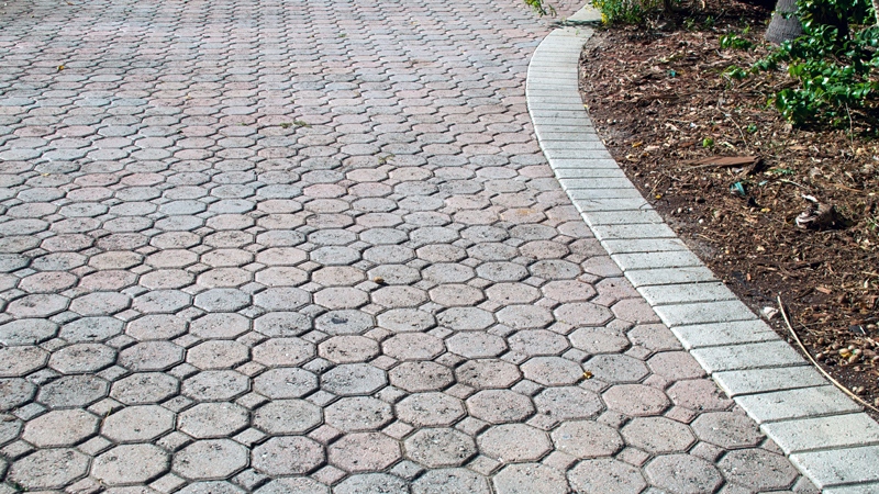A brick driveway is shown. (Shutterstock)