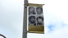 A banner displaying information about the Wood brothers' 1986 murder conviction flies in Guelph on Monday, June 5, 2017. (Terry Kelly / CTV Kitchener)