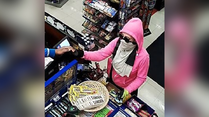 Windsor police are looking for a female suspect after a convenience store robbery on Howard Avenue in Windsor, Ont. (Courtesy Windsor police)