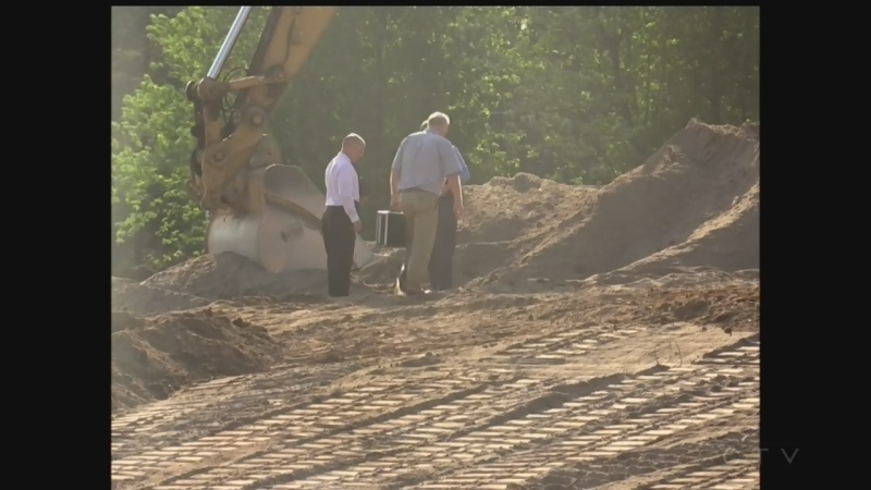 Investigators on scene where unidentified remains were discovered in Komoka, Ont, on Wednesday, June 14, 2017. (Reta Ismail / CTV London) 