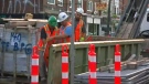 Crews begin work on College Street on June 19, 2017. 