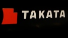 This July 6, 2016, file photo, shows the logo of Takata Corp. at an auto supply shop in Tokyo. (Shizuo Kambayashi/AP) 