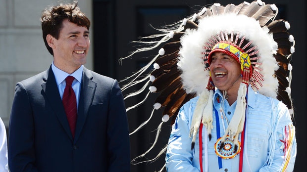Prime Minister Justin Trudeau and Perry Bellegarde, national chief of the Assembly of First Nations, celebrate National Indigenous Peoples Day in Ottawa on Wednesday, June 21, 2017. THE CANADIAN PRESS/Sean Kilpatrick