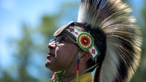 Grass dancer Stanford Tom from Lake of the Woods Region is shown on National Aboriginal Day at Major's Hill Park in Ottawa. (THE CANADIAN PRESS / Justin Tang)